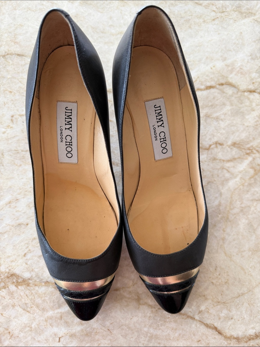 Jimmy Choo leather shoes with gold leather inserts.